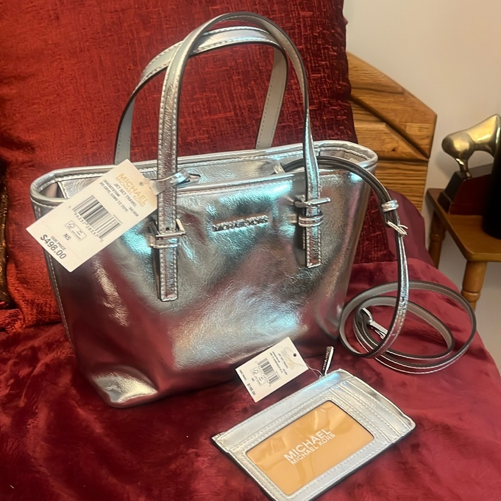 Michael Kors.   Brand new.  Combined retail price $700